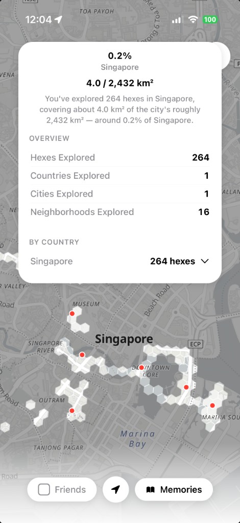 m.app map screen showing stamped hex tiles across Singapore with exploration stats